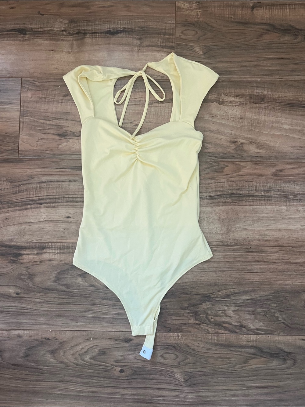 Light Yellow Ruched Front Tie-Back Bodysuit